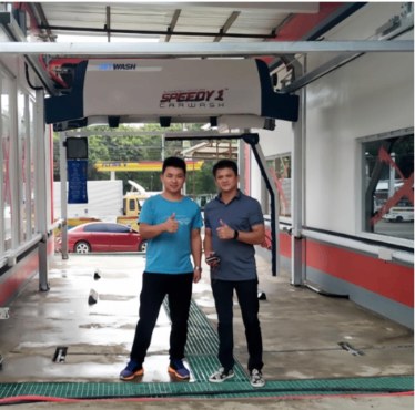 Operators at a JetWash forecourt wash