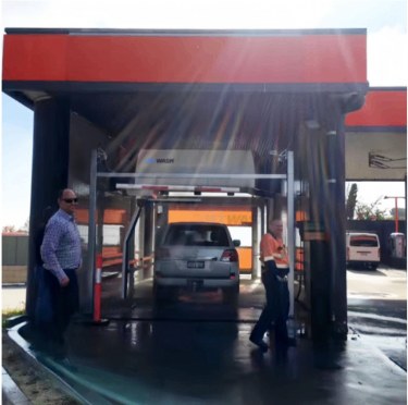 A car being washed in a JetWash bay